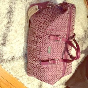 Purple duffle coach bag w/ shoulder strap- used